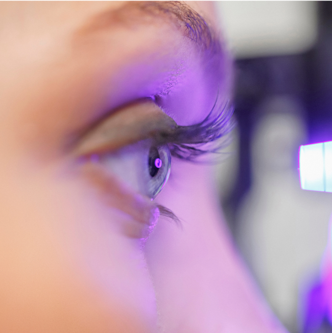 close-up on a woman's blue eye seen in profile